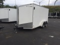 White 16ft v-nose trailer with rear barn doors