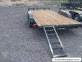 16FT EQUIPMENT TRAILER W/SLIDE OUT RAMPS