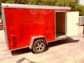 12FT - RED ENCLOSED CARGO TRAILER W/REAR RAMP 