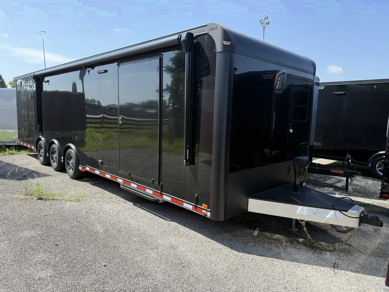 022974 - 2026 inTech 8.5' x 32' Triple Axle Black Car / Racing Trailer Car Hauler Trailer