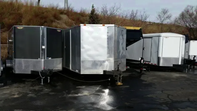 Silver 24ft v-nose car hauler