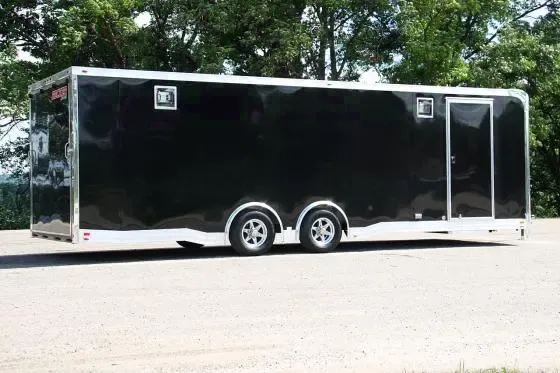 26FT BLACK SPREAD AXLE CAR HAULER-LOADED