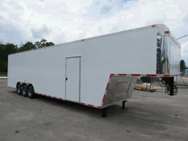 38FT GOOSENECK CAR HAULER WITH 3-5200LB AXLES