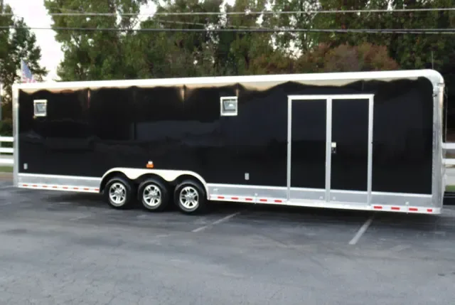 32FT  BLACK TRI-5200LB AXLE CAR HAULER