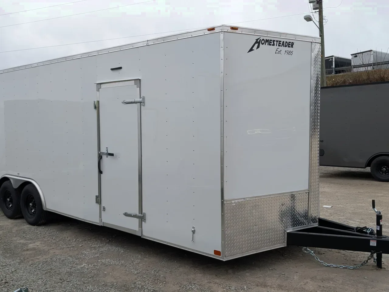 2026 Homesteader 8.5 x 24 HD SERIES Intrepid Car Hauler w/ Ramp (84" Inside)