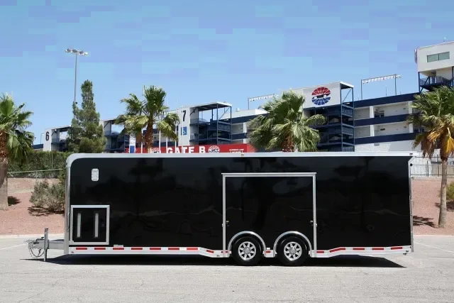 BLACK FLAT FRONT 28FT CAR HAULER W/ESCAPE DOOR