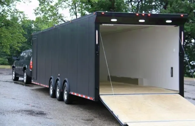 32FT BLACK CAR HAULER W/TRIPLE 5200LB AXLES