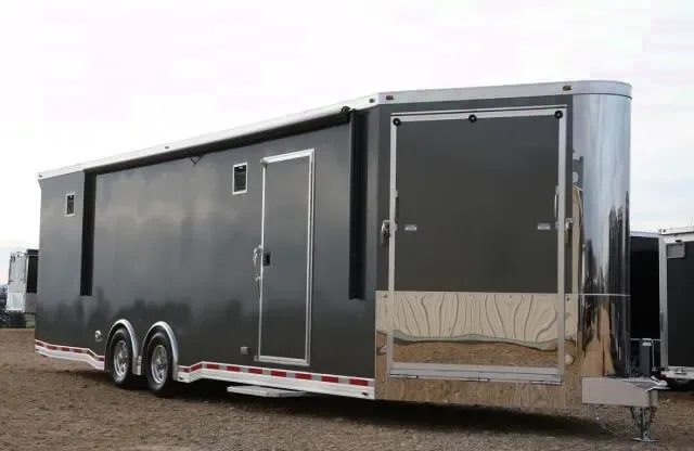 32 FT CAR HAULER W/ RAMP IN REAR AND FRONT