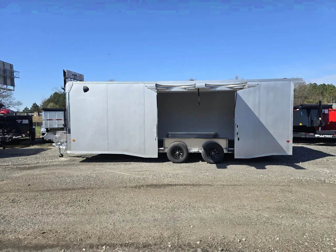 Enclosed 2026 8.5X24 EZ Hauler 8.5X24 Tandem Axle 10K Aluminum Car Hauler With Escape Door And Cabinets -ECMI8524-035185 8.5 ft. x24 ft.