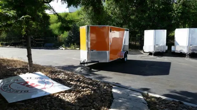 orange/black 12ft v-nose cargo trailer