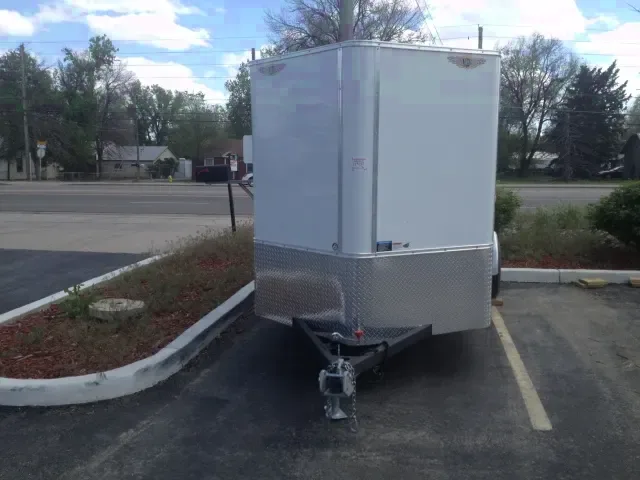 12ft white v-nose cargo trailer (ramp gate)