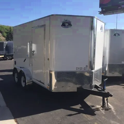 White 14ft v-nose trailer w/rear ramp gate