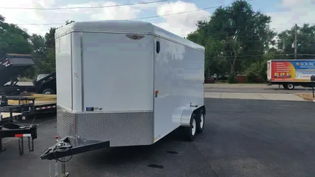 White 14ft v-nose cargo trailer with rear ramp door
