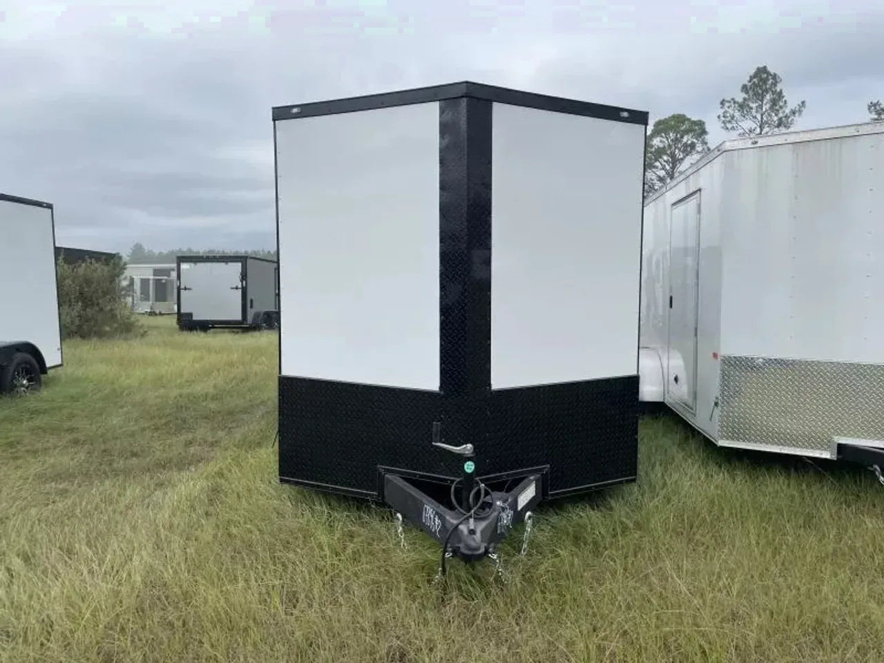 2026 Rock Solid Cargo 7 x 16 TA Enclosed Cargo Trailer | Polycore, Semi-Screwless, Blackout, Alloy W