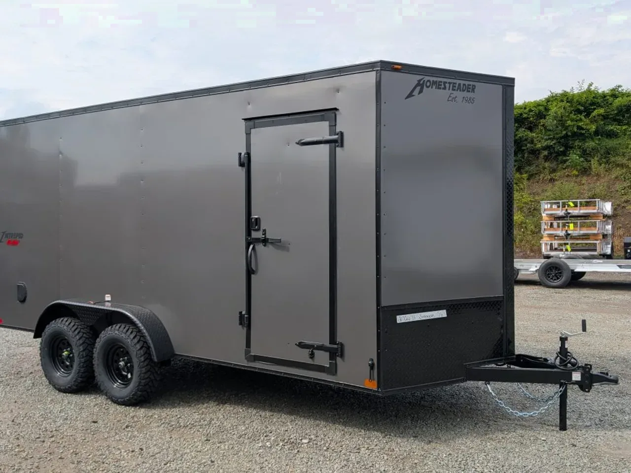 2027 Homesteader 7x16 Intrepid "OVERLAND" V-Nose Cargo Trailer w/ Ramp Door (84" INSIDE)