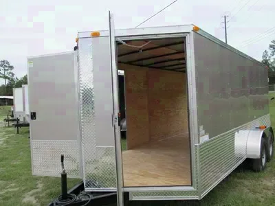 18FT CARGO TRAILER W/MAN DOOR ON BOTH SIDES OF V-NOSE