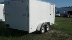 WHITE 12FT T/A V-NOSE WITH A RAMP DOOR