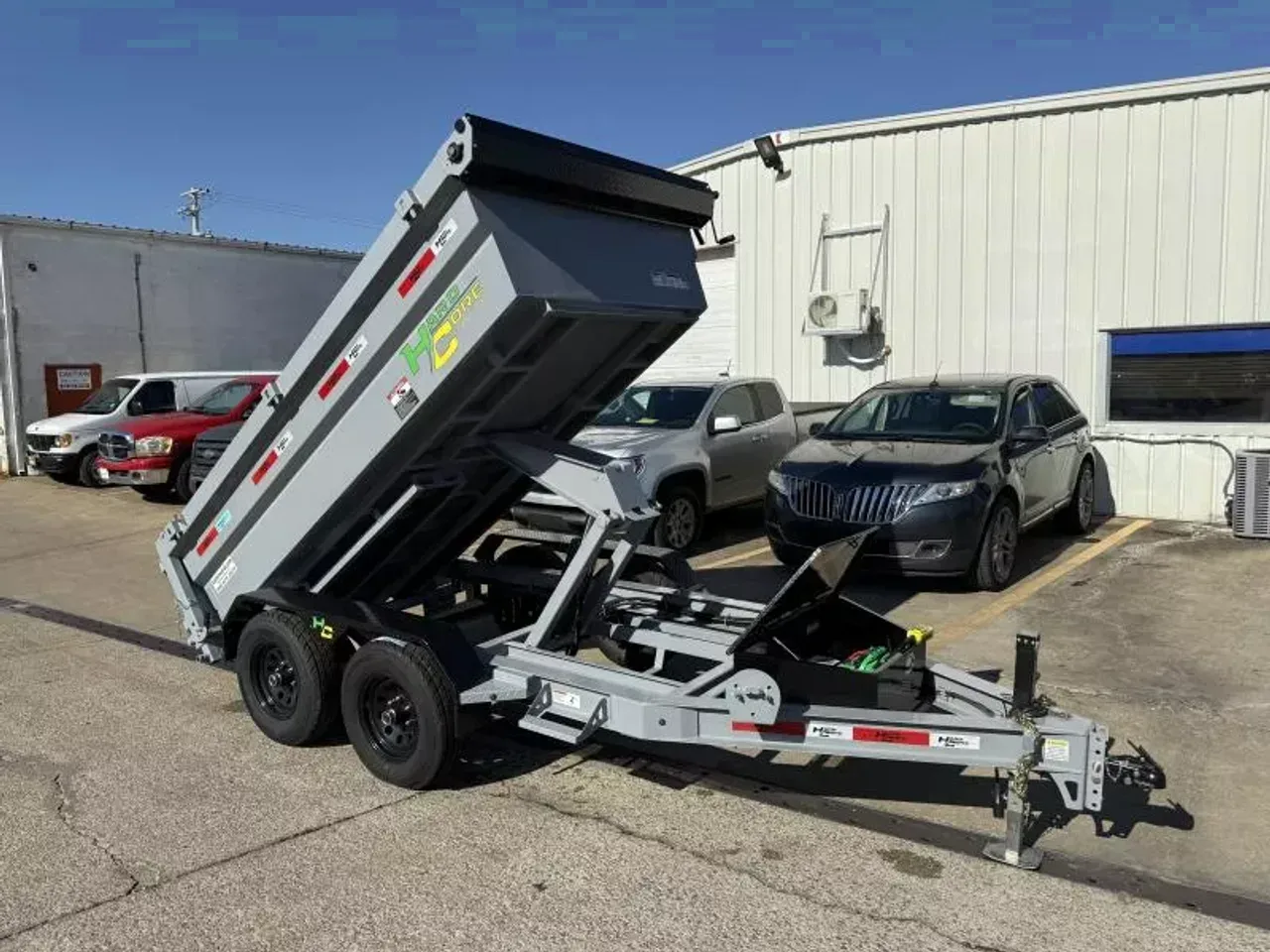 028420 - 2025 Hardcore Scissor Lift (2)5.2K Axles 5' x 10' Dump CLEARANCE Dump Trailer