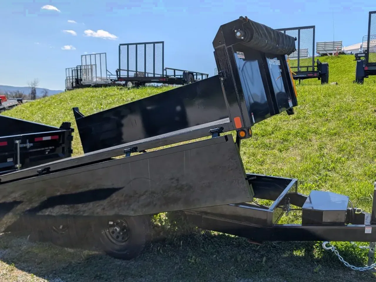 2026 Homesteader 6x12 Deckover Dump Trailer w/ Dropside on Curbside