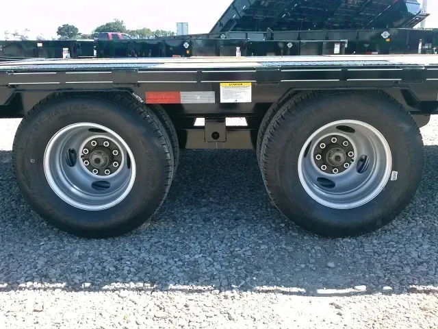 25FT PLUS 5 FOOT DOVETAIL FLATBED TRAILER W/RAMPS