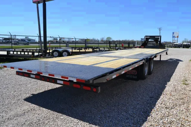 36ft Straightdeck Gooseneck Trailer with (2) Spring-Assisted & Double-Hinged Flip-Over Ramps