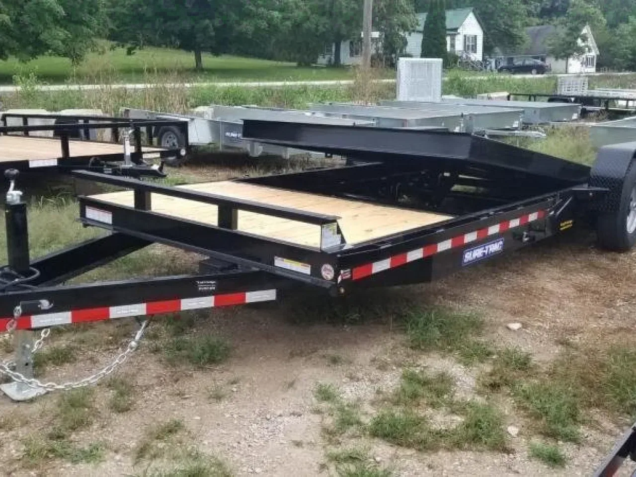 2026 Sure-Trac 7x18+4 Tilt Deck Equipment Trailer w/4" Stationary