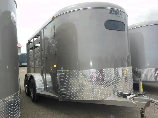 beige 2 horse trailer w/ drop windows