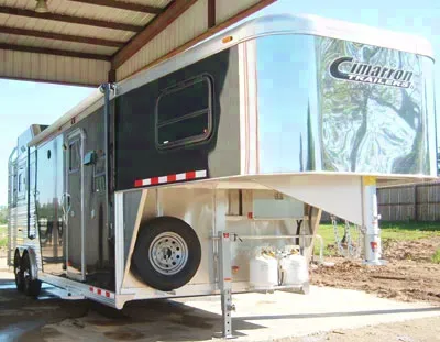 Black 3 horse trailer w/living quarters and generator