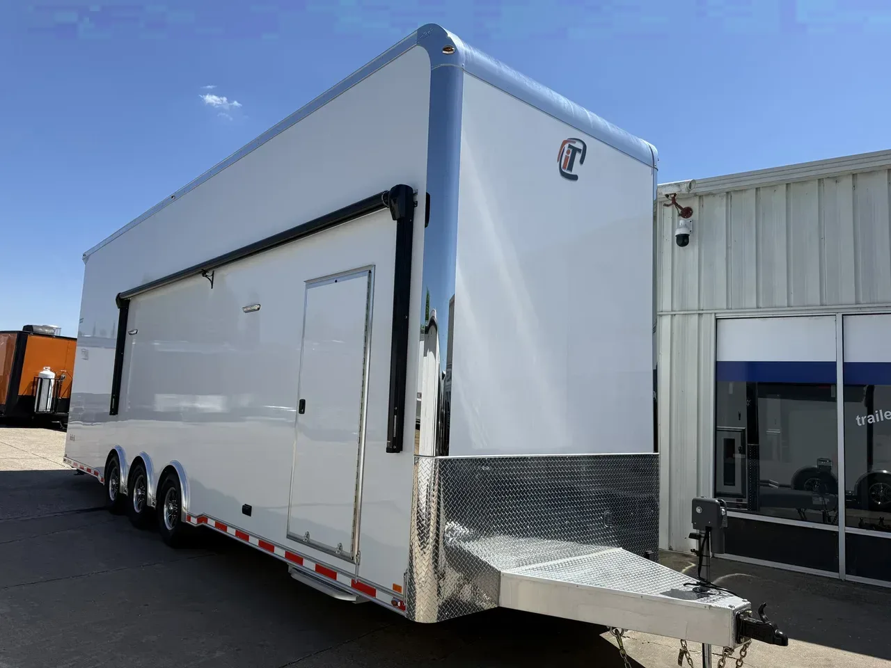 023492 - 2026 inTech 8.5' x 32' Tri-Axle Stacker + Awning & Escape Door Stacker Trailer