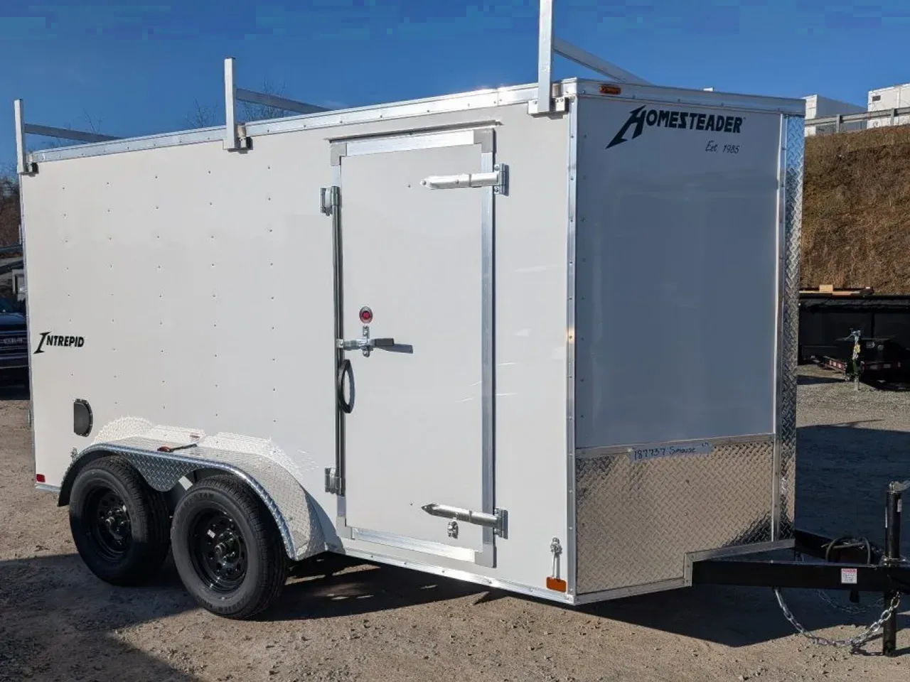2026 Homesteader 6x12 Tandem Intrepid V-Nose Contractor Trailer w/ Rear Barn Doors & Ladder Racks