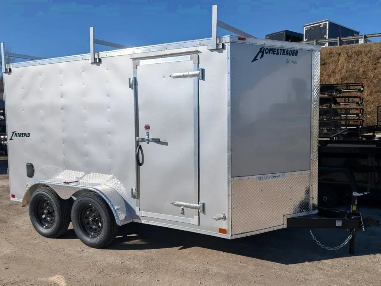 2027 Homesteader 7x12 Tandem Intrepid V-Nose Contractor Trailer w/ Barn Doors & Ladder Rack