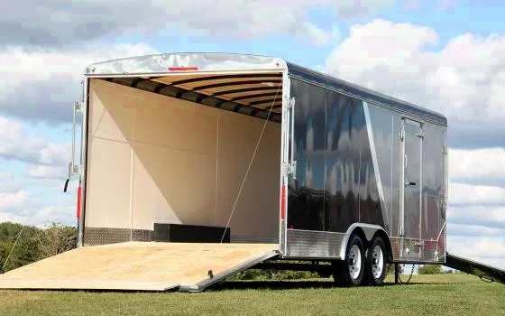 SILVER AND BLACK 28FT SNOWMOBILE/AUTO COMBO TRAILER