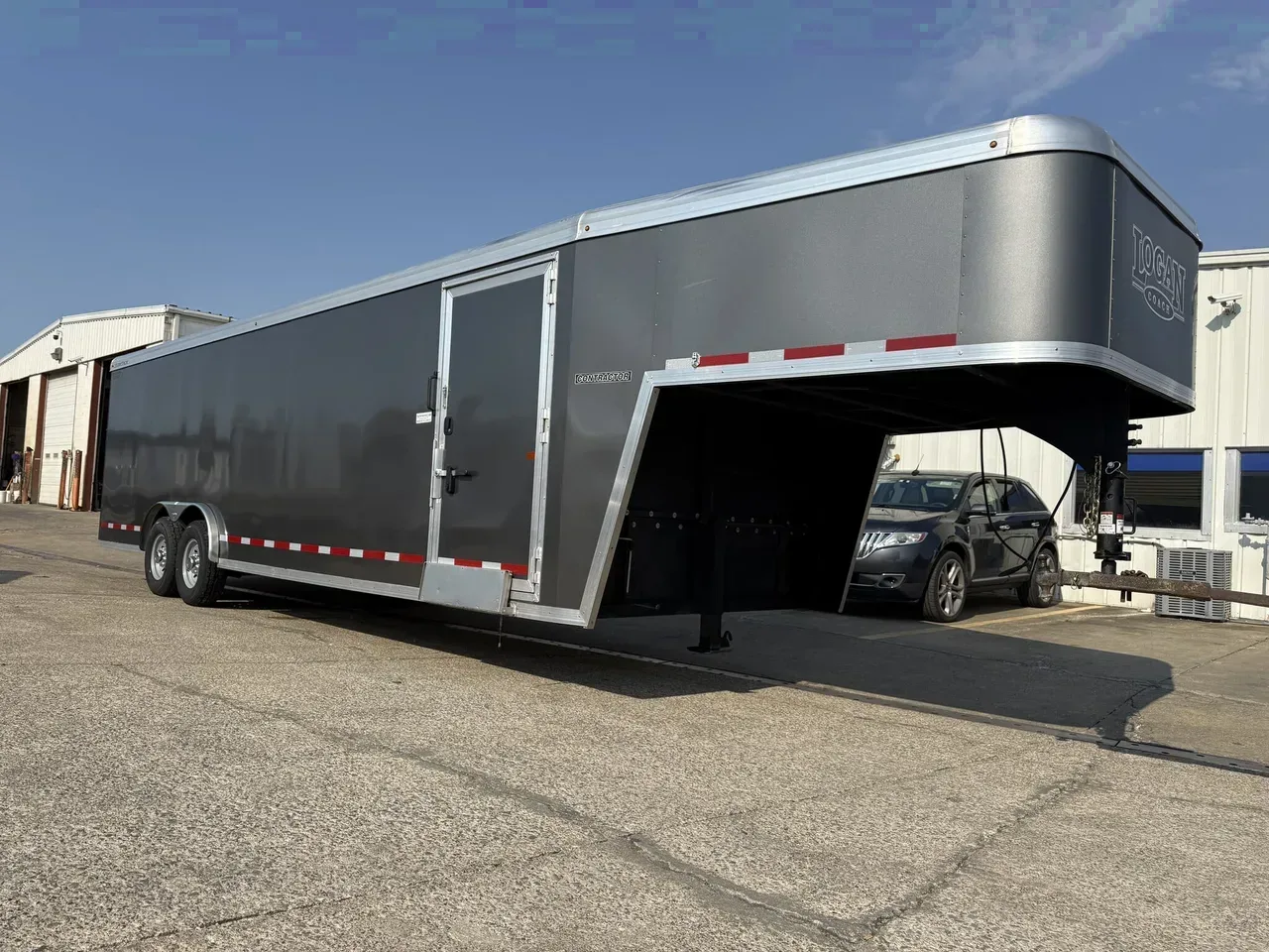 012413 - 2023 Logan Coach Contractor 8.5' x 34' Overall Enclosed Gooseneck (2)7K Axles Car Hauler Trailer