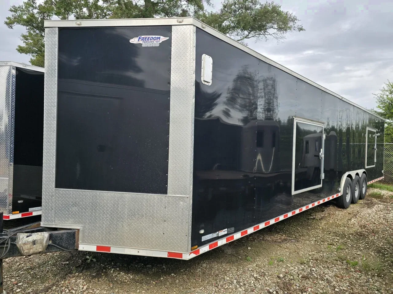 Enclosed 2024 8.50X36 Freedom Trailers USED 8.5×36′ Enclosed Car Hauler With Escape Doors -eccw8536-USED-084912 8.50 ft. x36 ft.