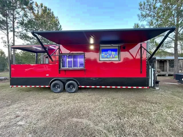 8.5ft x 28ft custom food truck with 10ft porch and full bathroom.